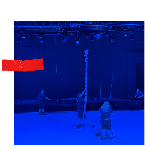 technicians working on the stage