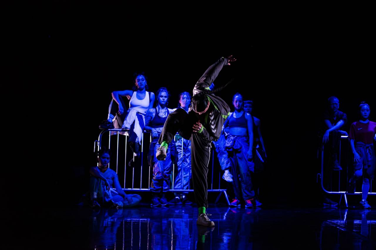 dancers in blue light and streetwear